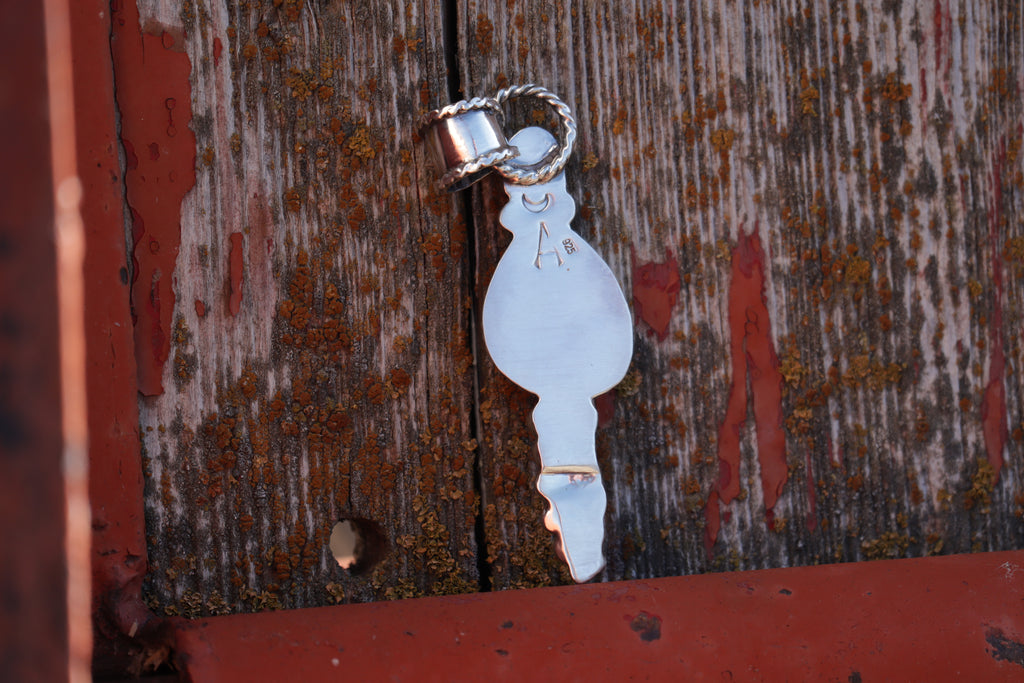 Bone Collector Pendant.