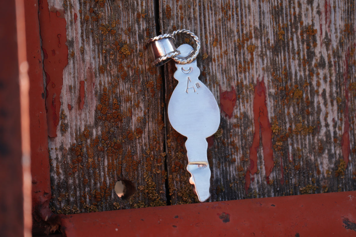 Bone Collector Pendant.