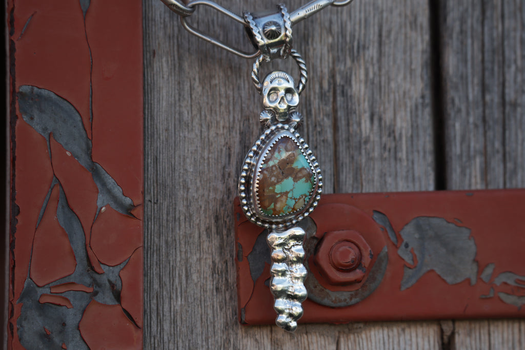 Bone Collector Pendant.