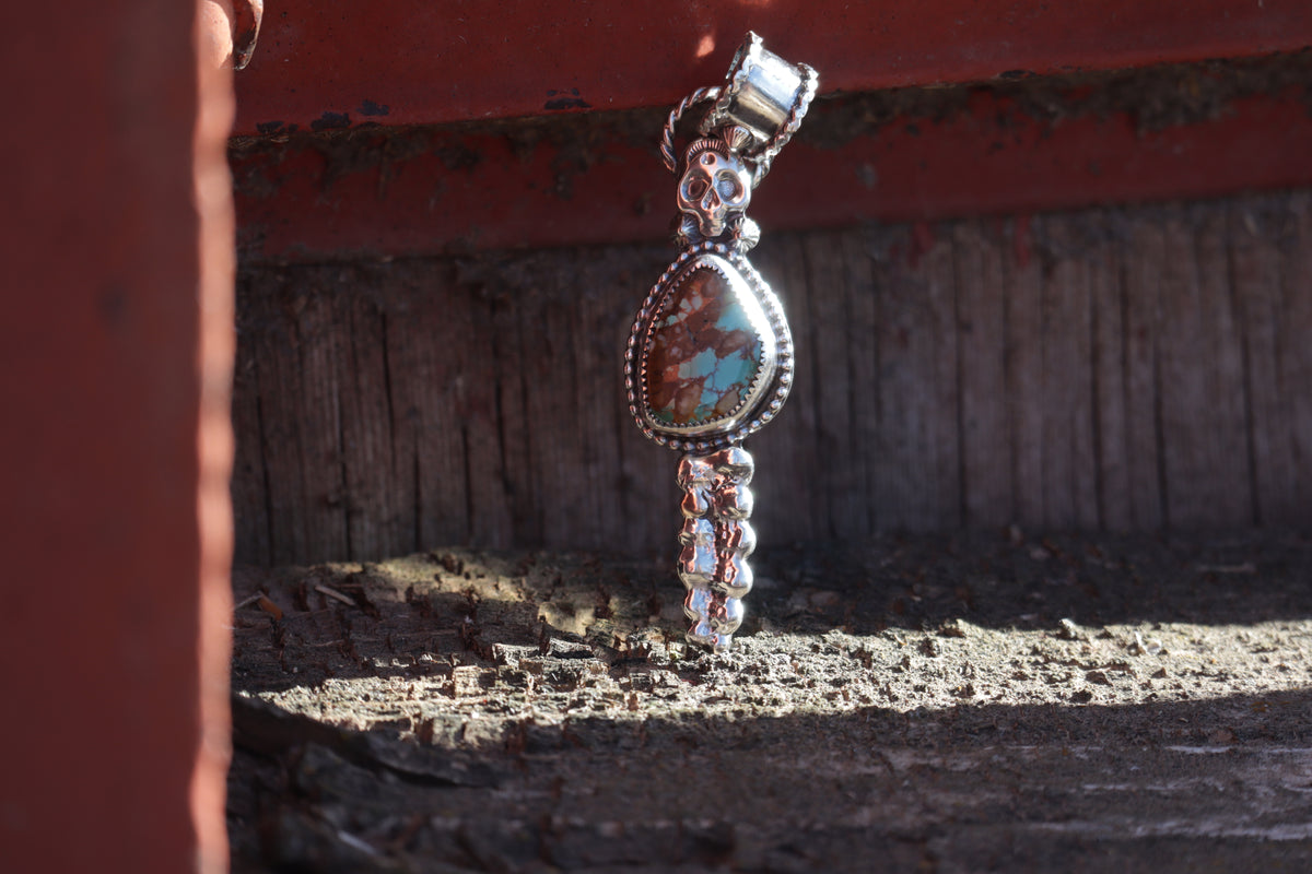 Bone Collector Pendant.