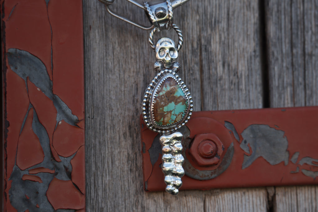Bone Collector Pendant.