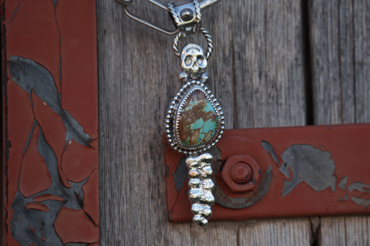 Bone Collector Pendant.