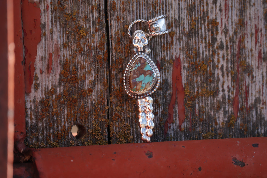 Bone Collector Pendant.